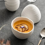 Egg-Shaped White Ceramic Bowl