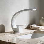 White waterfall basin mixer tap on a stone basin